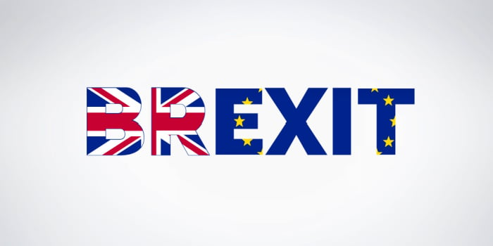 scritta brexit con bandiera UK e UE