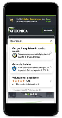 Schermo di un smartphone che mostra il trustbadge sul sito dell'ecommerce atecnica, cliente di trusted shops
